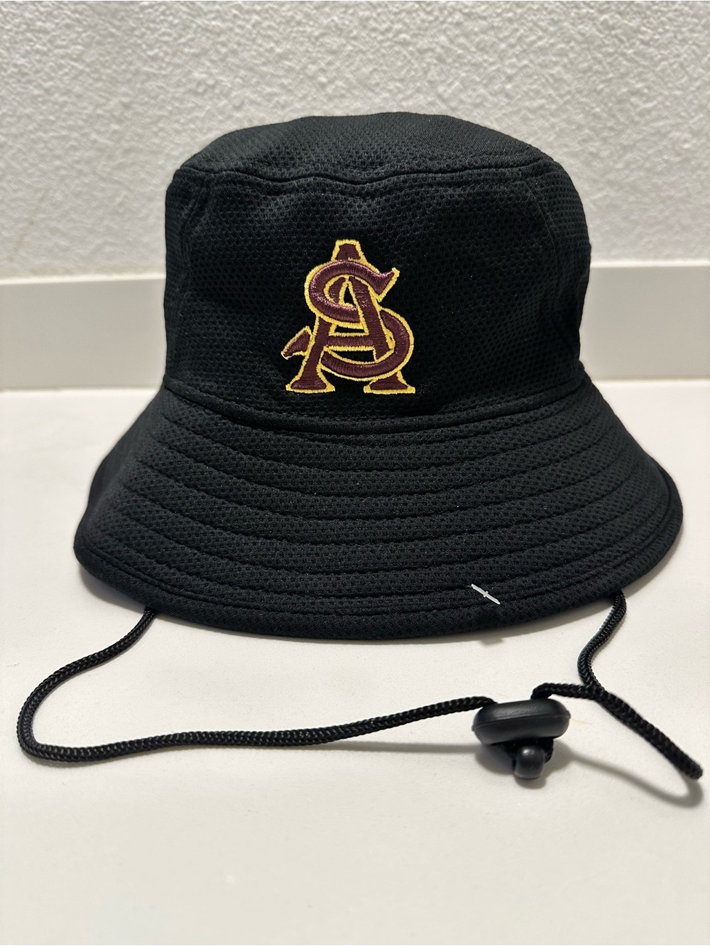 New Era Black Bucket Hat with Gold & Maroon Logo